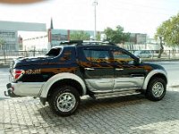 Umflatura laterala Mitsubishi L200 '11+
